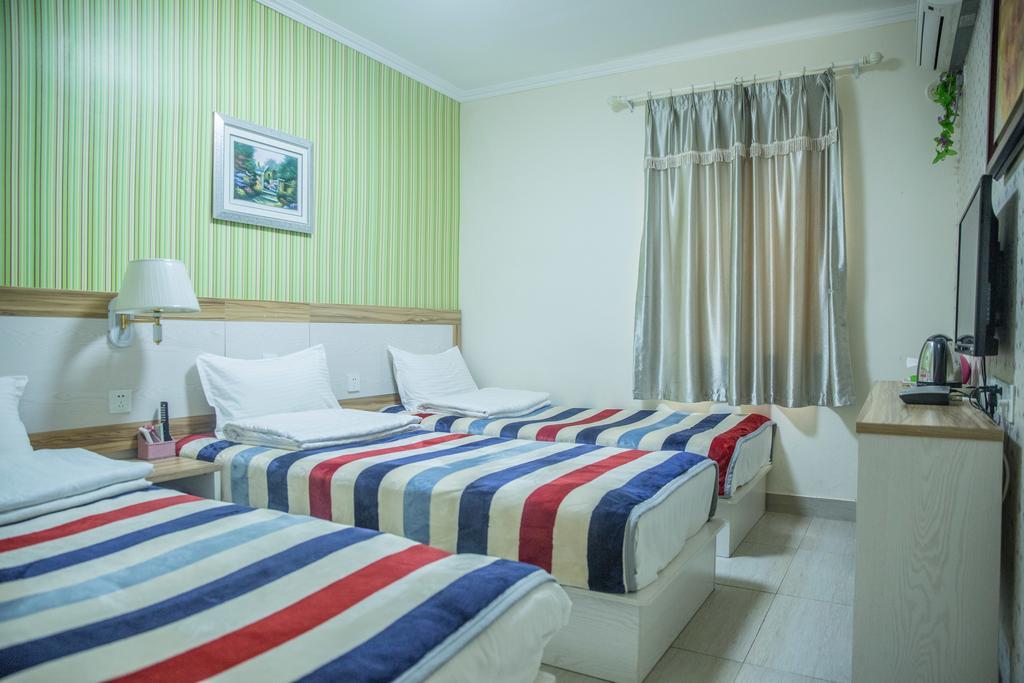 Qingdao Haibianke Hostel Habitación foto