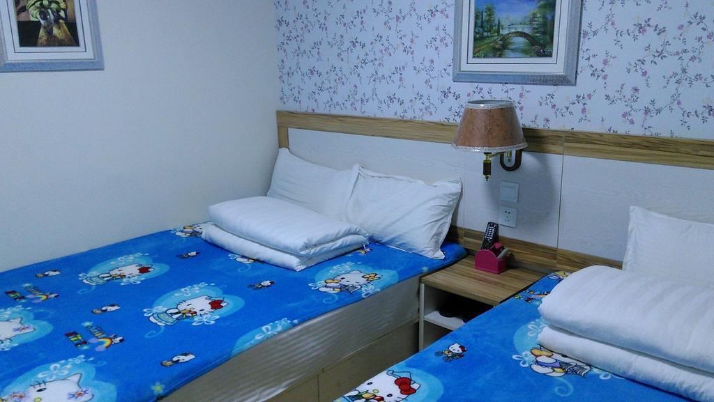 Qingdao Haibianke Hostel Habitación foto